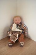 A modern Reborn made up Baby Doll, fully dressed, height approx 50cm