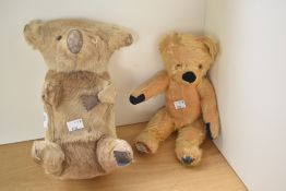 A Chad Valley yellow plush straw filled Teddy Bear having plastic eyes, stitched nose and mouth,