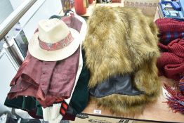 A collection of Doctor Who related clothing including Fur Jacket, Jumpers, Jackets and Hats