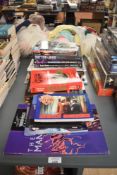 A collection of Doctor Who Ephemera including Paper Backs, Postcard Collection, Graphic Novel etc (