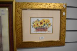 After Ruth Baderian (20th Century, American), coloured print, A basket of sunflowers, framed,
