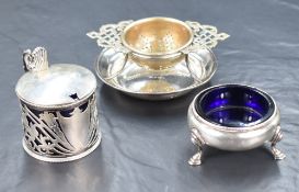 A George III silver salt having bead rim and raised on three cabriole legs, marks for London 1774,
