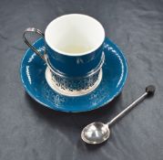 A cased George V silver mounted Elenes English China coffee set, comprising six cups, saucers and