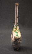 A Japanese Meiji period white metal vase, of tapered bulbous form, having ornate three-toed