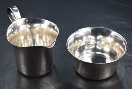 A Württembergische Metallwarenfabrik WMF white metal sugar and cream, of traditional design having