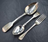 A William IV silver fiddle pattern serving spoon, having 'MK' monogram to the terminal, marks for