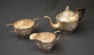 An Eastern or possibly colonial white metal three piece tea set, of quatrefoil form comprising