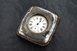 An Edwardian silver mounted pocket watch case of square form, engraved with 'LVS' monogram, marks