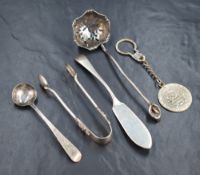 A George III silver condiment spoon, having bright engraving, marks for London 1801, rubbed makers