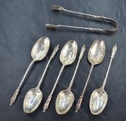 A set of six Victorian silver Apostle spoons and sugar tongs, the bowls having embossed scroll