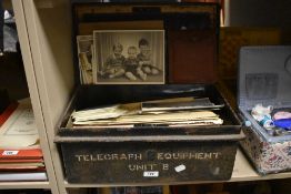 A selection of ephemera comprising vintage photographs, novelty stamps etc.