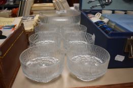 A vintage Ravenhead glass 'Topaz' dessert set, comprising one large bowl and six smaller, each