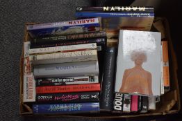 An assortment of books surrounding Marilyn Monroe comprising titles 'The Marilyn Files', 'Marilyn in
