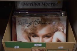 A large selection of Marilyn Monroe calendars.