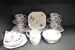 A Shelley bone china 'Bluebird' pattern six setting tea set, comprising six cups, six saucers, six