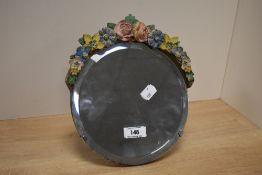 A vintage barbola style dresser mirror with fold out stand to rear.