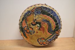 A Chinese hand-decorated double sided Tanggu drum, decorated with dragon and phoenix 31cm