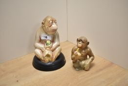 Two Beswick Pottery figures, Monkey on black glazed pottery base No397 and a pipe smoking Chimpanzee