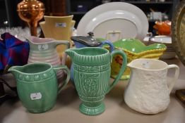 A vintage Crown Devon mottled beige pitcher, Burleigh ware basket vase having floral decoration