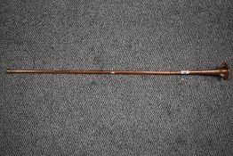 A vintage copper coaching horn, measuring 100cm.