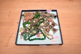 An assortment of costume jewellery, including large statement pieces, beaded necklaces and bracelets