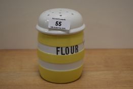 An original T.G Green yellow and white Cornish Kitchen Ware flour dredger, complete with pierced