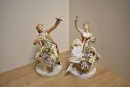 A pair of German Thuringia Schierholz Porcelain figures, modelled as a young male and female both
