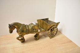 A heavy vintage brass horse and cart figurine.