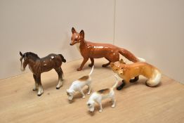 A Beswick pottery fox study, model 1016a designed by Arthur Gredington in red/brown and white