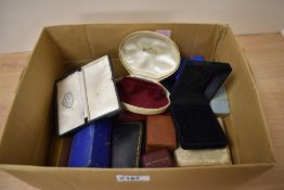 A collection of vintage and modern jewellery boxes, including ring boxes, bracelet boxes and stick