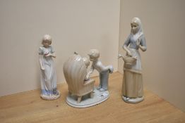 A group of three Lladro style porcelain figurines, one bearing mark for Miguel Requena (flake chip)