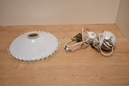 A 20th century white ceramic pendant light fitting with egg shaped adjustment pulley and crimped