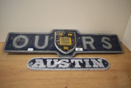 An interesting cast and painted metal Oxford University sign, with central university arms