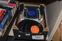 An assortment of 7'' singles comprising titles 'Almost There' and 'The Old Rocking Chair' etc.