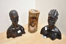 A 20th Century folk art style drift wood facial carving, measuring 18cm high, and two African