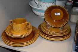 A small selection of mid-20th Century Portmeirion Totem patterned tableware including dinner and