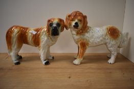 Two 19th Century Staffordshire porcelain St Bernard Dog studies, one having glass amber eyes, each