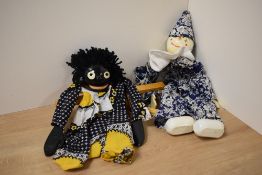 Two puppets in the style of Pelham, one oriental and the other AF.