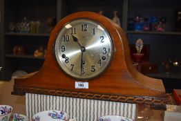 A vintage Lepps Bury inlaid mantel clock, having pendulum.