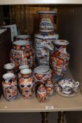 A selection of Imari ware possibly Arita, comprising vases, cup and saucer, ginger jars etc.