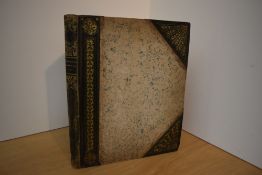 Illustrated. A 19th century scrapbook containing numerous engraved plates. The plates have been