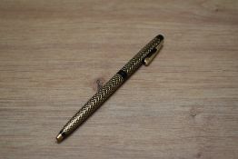 A Sheaffer Lady 904 ballpoint pen in black and gold lacquer paisley pattern