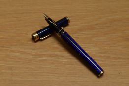A Sheaffer Targa 1087 Classic converter cartridge fill fountain pen in laque blue moire having