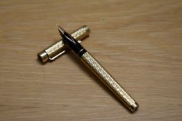 A Sheaffer Targa Craftsman Classic converter cartridge fill fountain pen in gold plated diamond