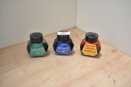 Three bottles of Waterman ink red, blue, and green
