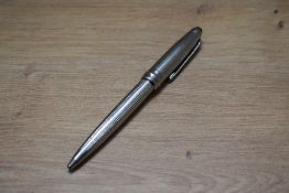 A Montblanc Meisterstuck Pix ballpoint pen in chrome