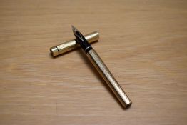 A Sheaffer Targa 1007 Classic cartridge converter fill fountain pen a gold plated chequered having a