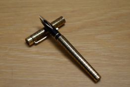 A Sheaffer Targa 684 Classic converter cartridge fill fountain pen in Medici crosshatch pattern