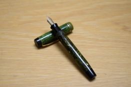 A Parker Duofold Junior button fill fountain pen in Jade Green with two bands to the cap having