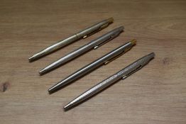 Four Parker Classic ballpoint pens in various metallic finishes